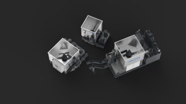 A picture of three GROSS briquette presses against a dark background