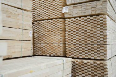 Squared timber, stacked and packed